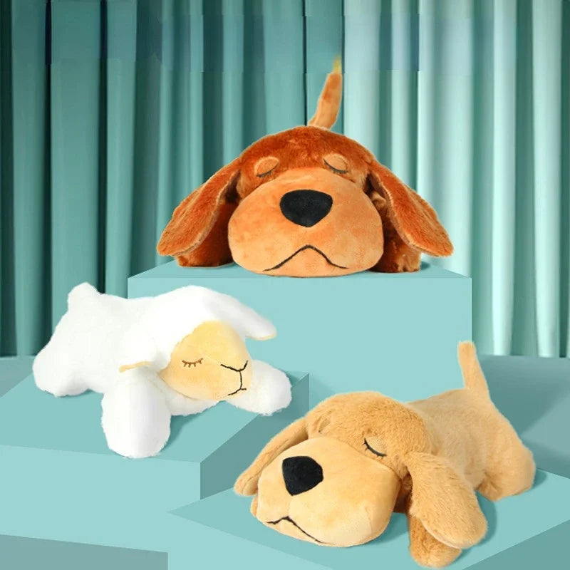 Dog cuddling with heartbeat simulation plush toy for sleep comfort
