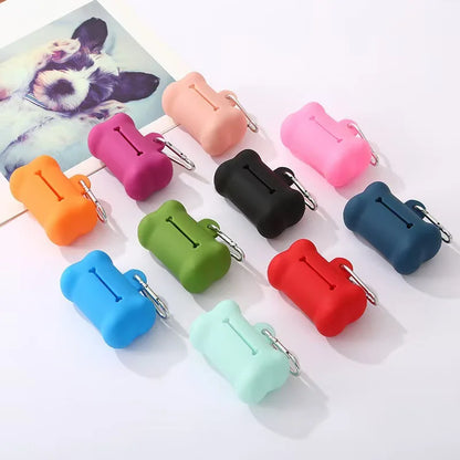 Bone-shaped PVC dog waste bag dispenser in assorted colors for outdoor walks
