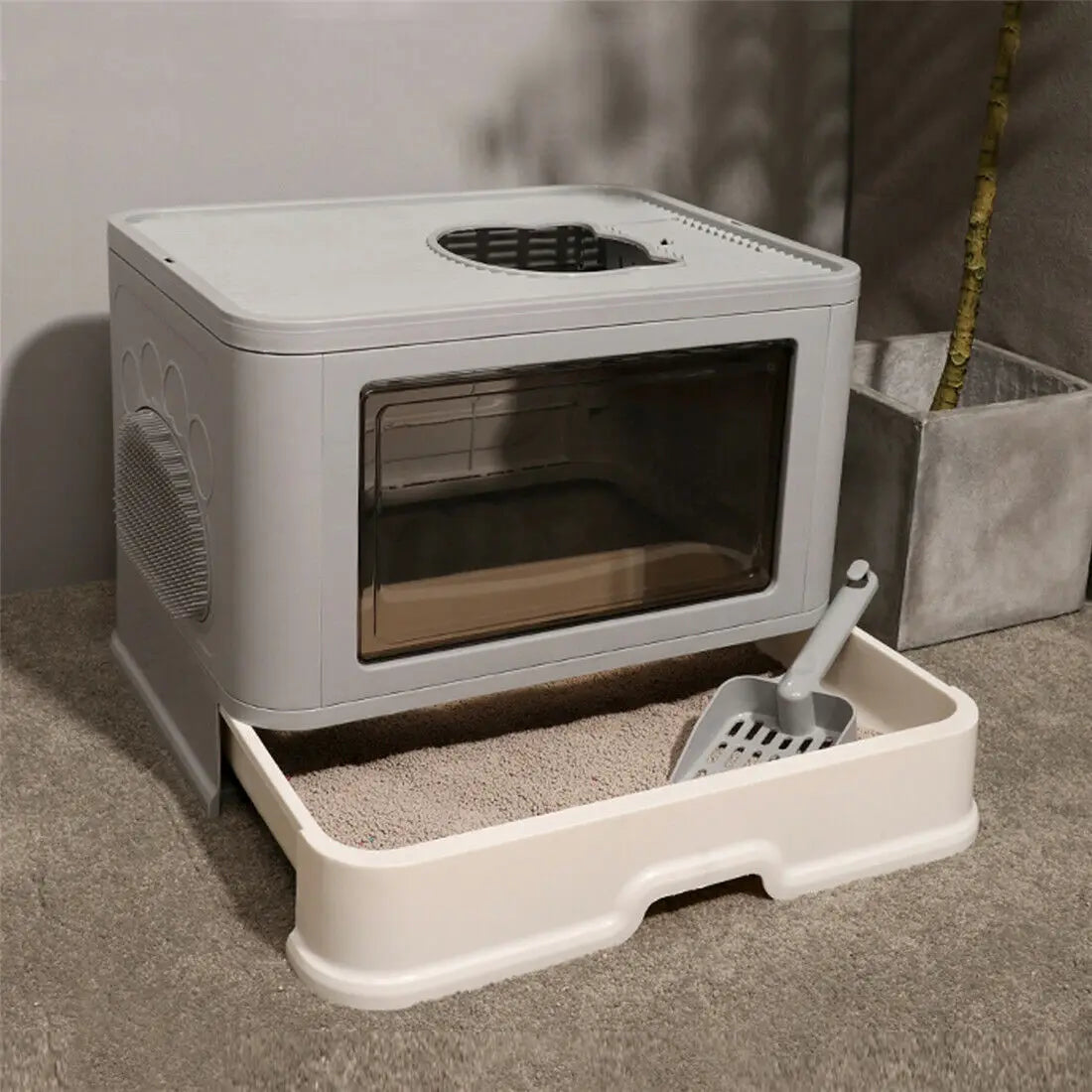 Foldable enclosed cat litter box with top entry, scoop holder, and modern design
