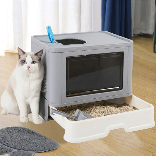 Foldable enclosed cat litter box with top entry, scoop holder, and modern design
